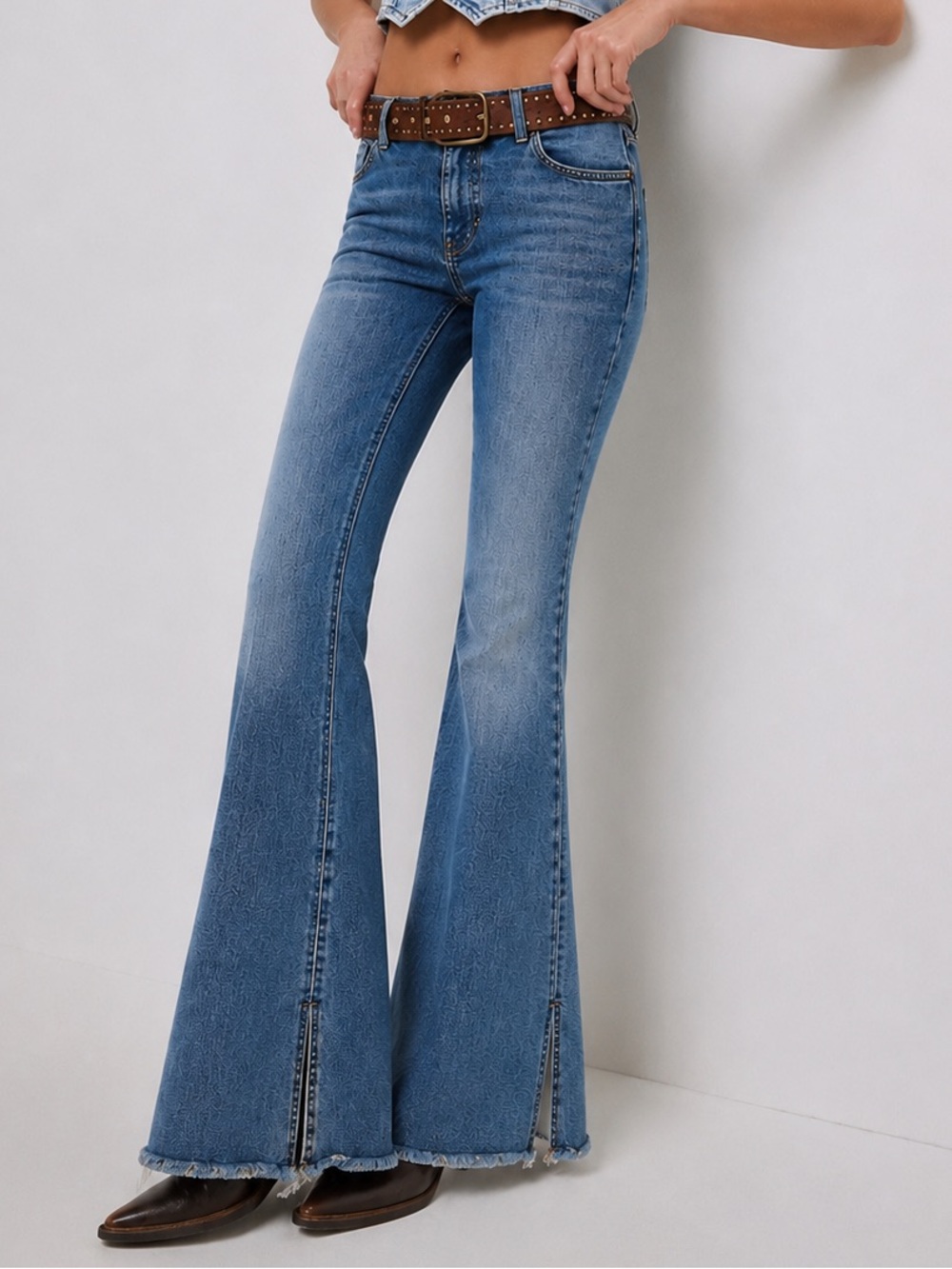 We The Free High Rise Raw Hem Flare Jeans Medium Wash size 28